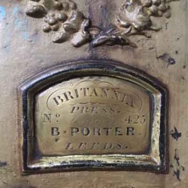 Name plate on old printing press
